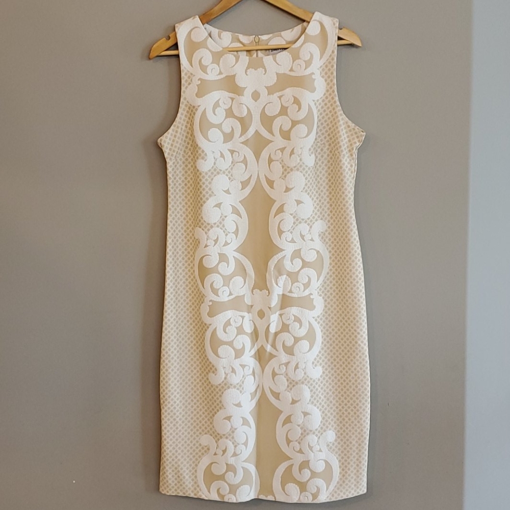 Beautiful cream lace pattern sleeveless dress